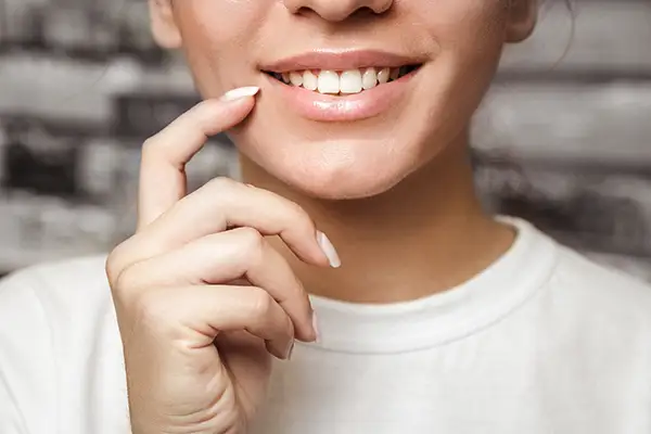 The Secret To A Healthier, More Confident Smile
