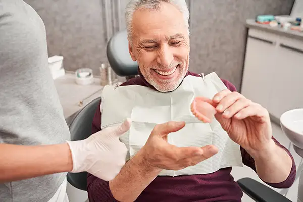 Complete set of removable dentures for full arch tooth replacement