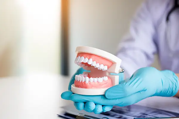 Immediate dentures placed directly after tooth extraction for instant restoration